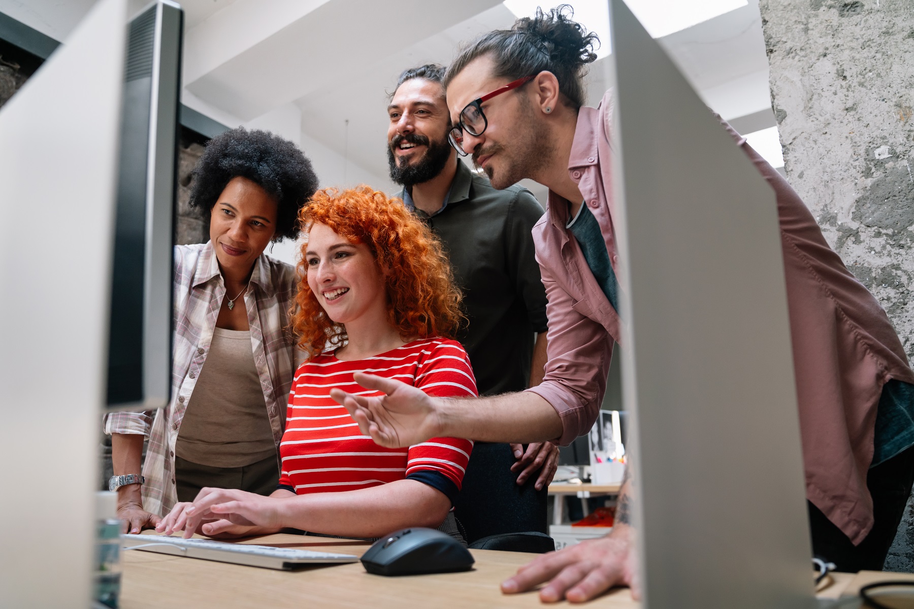 Smiling diverse colleagues gather in boardroom brainstorm discuss financial statistics together sara kurfess b4ndbw2r q8 unsplash